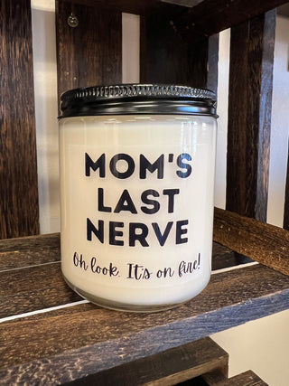 Jar labeled 'Mom's Last Nerve' on a wooden surface