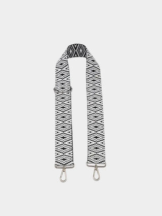 A black and white patterned fabric shoulder strap with silver metal swivel clips on both ends, displayed against a light gray background.
