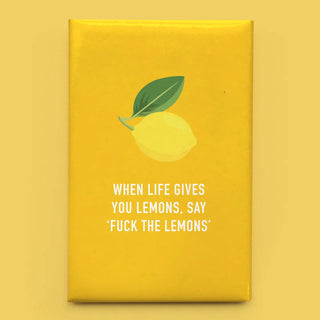 A yellow rectangular product package or box with a printed lemon illustration and the text 'WHEN LIFE GIVES YOU LEMONS, SAY *FUCK THE LEMONS*' on a matching yellow background.