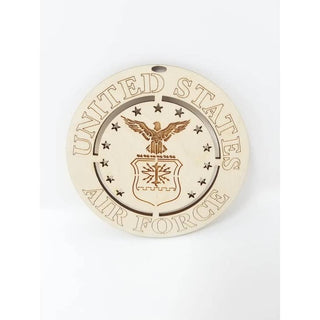 A round wooden ornament featuring the United States Air Force emblem and text, shown on a plain white background.
