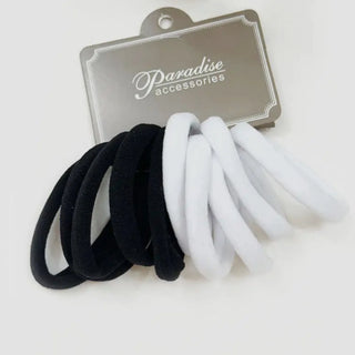 Black and white hair ties on a Paradise Accessories branded card.