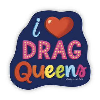 A die-cut sticker with the text 'i [heart] DRAG Queens' in colorful playful lettering on a dark navy blue background. The small copyright text '© GREY STREET PAPER' is visible in the lower right.