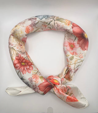 Floral patterned neck pillow on a white background