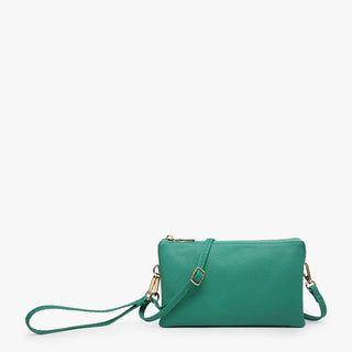 Green handbag with a strap on a white background