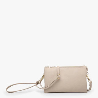 Beige handbag with a strap on a white background