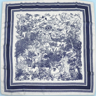 Navy blue and white patterned fabric square with nature-themed design