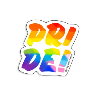 A die-cut vinyl sticker featuring the word 'PRIDE!' in bold, rounded letters with a vibrant rainbow gradient transitioning through red, orange, yellow, green, blue, and purple. The sticker has a white border and a small copyright mark reading '@DID STREET PARK' on the bottom right, set against a plain white background.