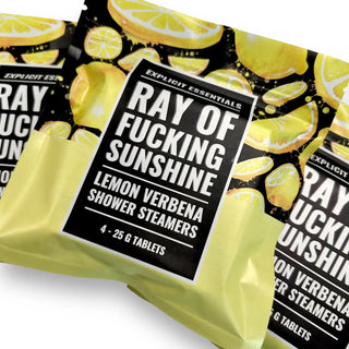 Three packs of Explicit Essentials Ray of Fucking Sunshine Lemon Verbena Shower Steamers, featuring a black and yellow lemon graphic design with a central black label.