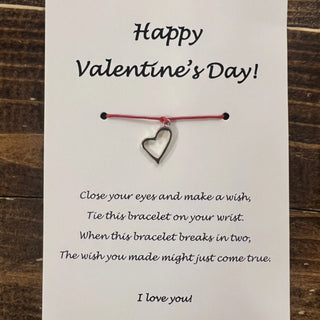Valentine's Day card with a heart-shaped bracelet and text on a card